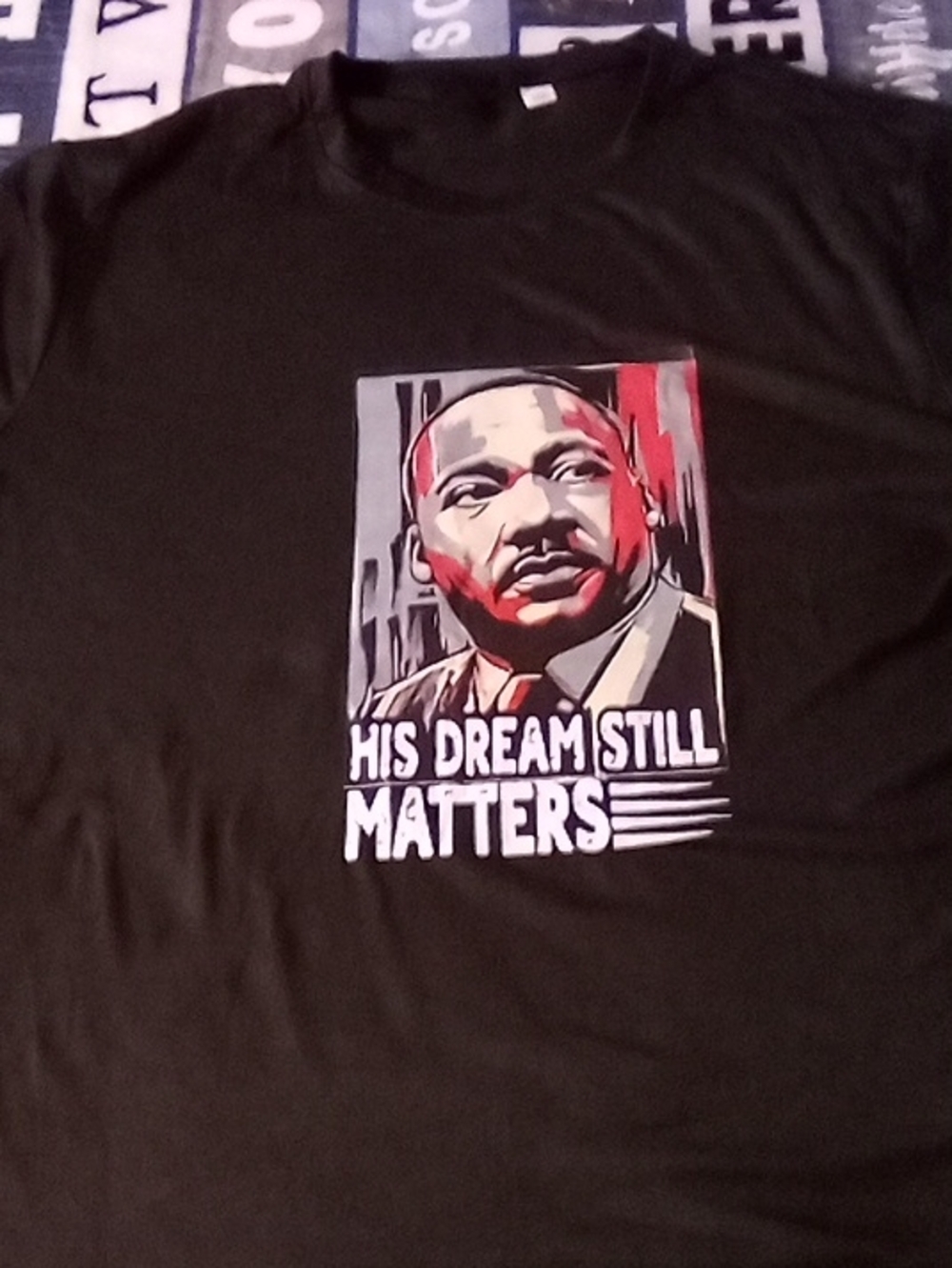 Black Short-Sleeve Graphic Tee — 'His Dream Still Matters'